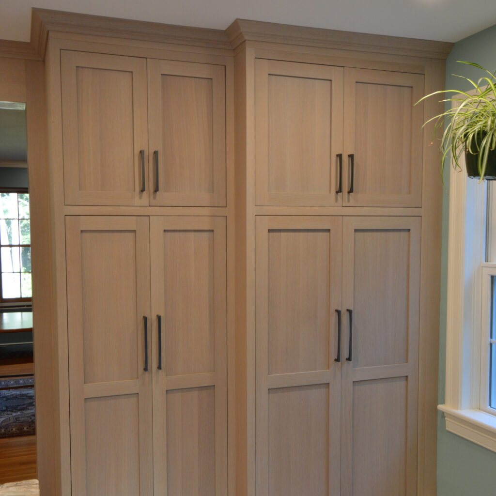 Custom pantry with mission style wood cabinets