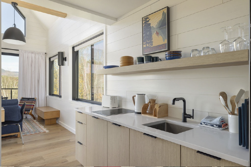frameless full access cabinets in a white kitchen