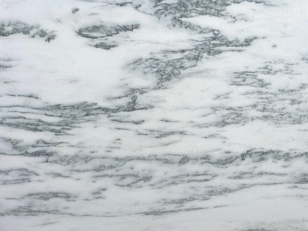slab of mountain white honed marble